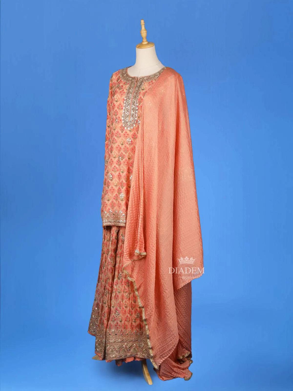 Dark Peach Sharara Set Adorned with Floral Printed Designs, Paired with Dupatta