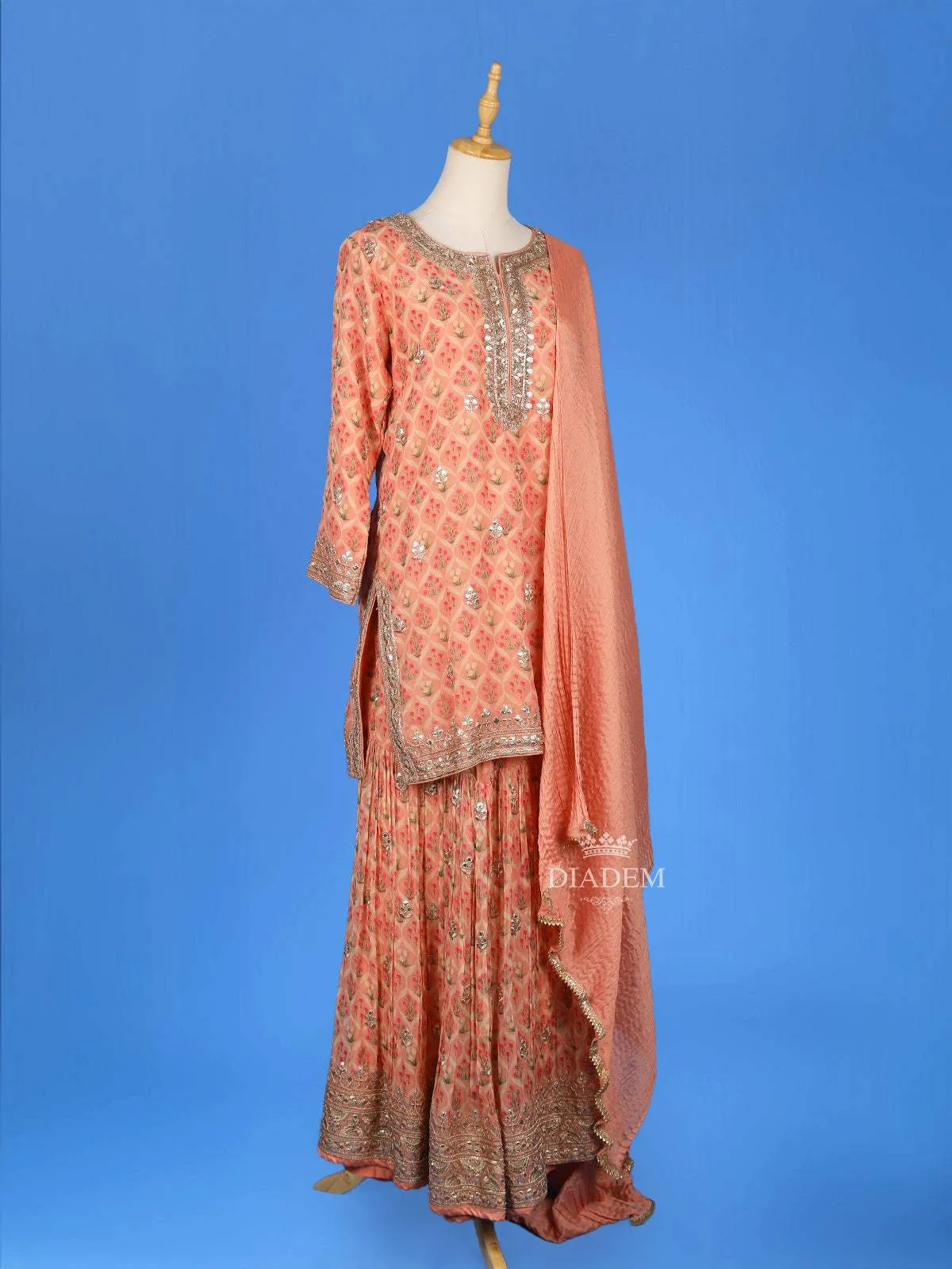 Dark Peach Sharara Set Adorned with Floral Printed Designs, Paired with Dupatta