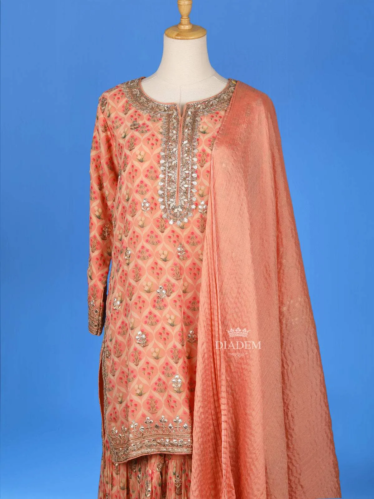 Dark Peach Sharara Set Adorned with Floral Printed Designs, Paired with Dupatta